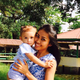 Between haze episodes: Ria Heilena Pratiwi, with daughter, outside her mother’s open-air restaurant in Pekanbaru.